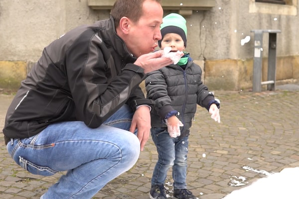 man-and-child-standing-on-foamstream-foam