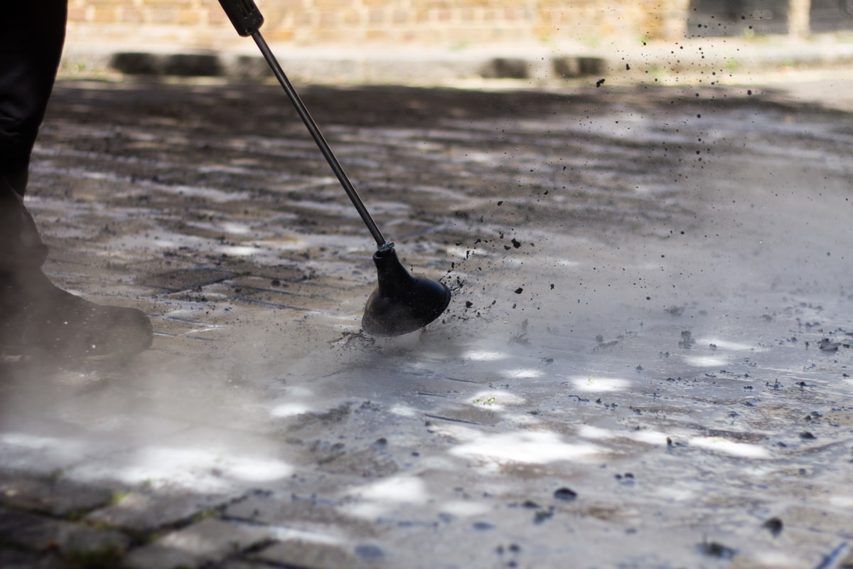 high pressure lance cleaning moss from block paving Foamstream Weedingtech