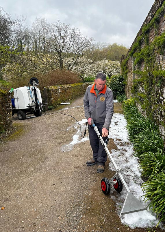 Using hot foam to control weeds